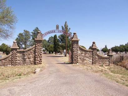 Post Tx - Terrace Cemetery Entrance with round rock gate piers 