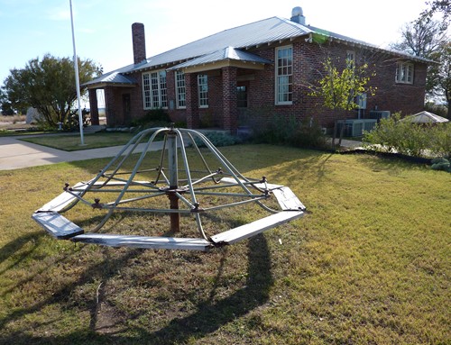 Eulogy Texas schoolhouse  merry-go-round