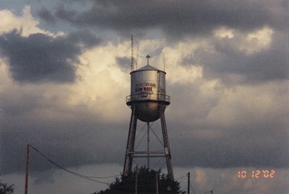 Glen Rose, Texas water tower before thunderstorm