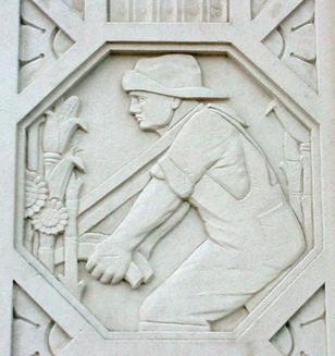Architectural detail - Man plowing field