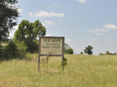 Hodgson, Texas - New Hope Missionary Baptist Church & Cemetery sign