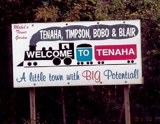 Teneha welcome sign showing "Tenaha, Timpson, Bobo and Blair"