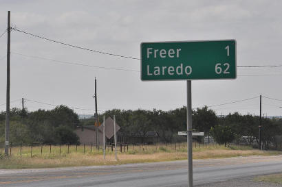 Freer TX - mileage sign, 62 miles to Laredo