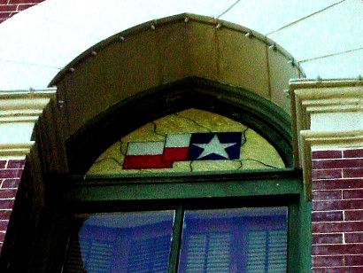 TX - Gonzales County Courthouse Window with flag