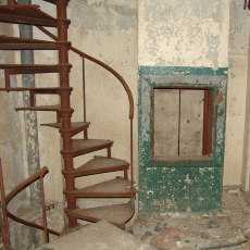 Hotel dumbwaiter and spiral stairs