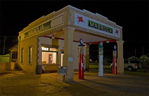 old gas station at night