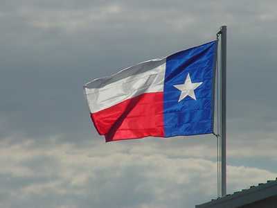 Texas Flag  flying over Dinero, Texas
