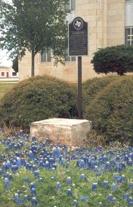1888 Knox County courthouse cornerstone and bluebonnets