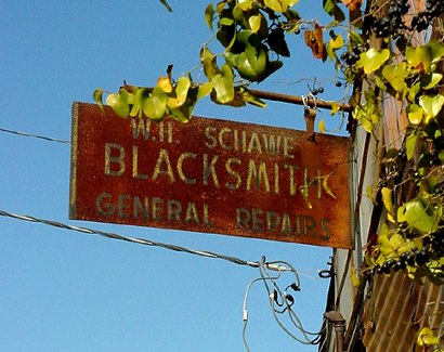 Brenham TX Blacksmith Sign With Vine