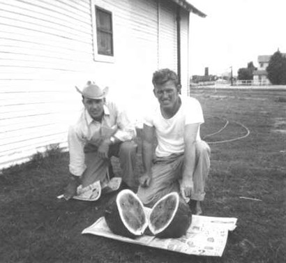 Hank Mellilo and Stan Grzywacz sharing water melon