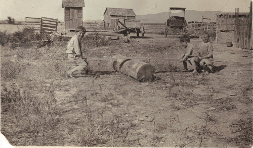 Bailey children on seesaw, Lobo Texas old photo