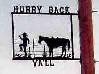 Cowboy and horse by the fence metal sign