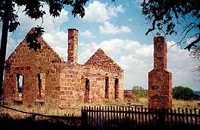 Pontotoc Texas stone ruins with picket fence