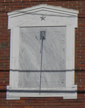 A vertical sundial in San Augustine, Texas