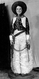 vintage photo of women in cowgirl outfit