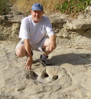 Dinosaur Tracks  with Will Beauchamp for scale, Dinosaur Valley State Park 