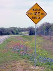 Watch for ice on brige sign