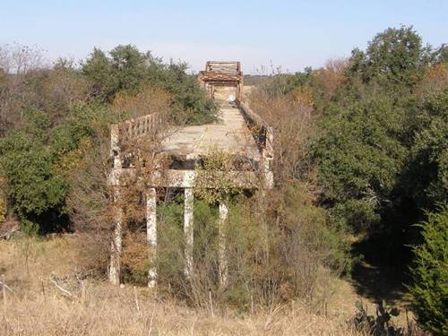 End of the condemned Winchell Bridge , Texas
