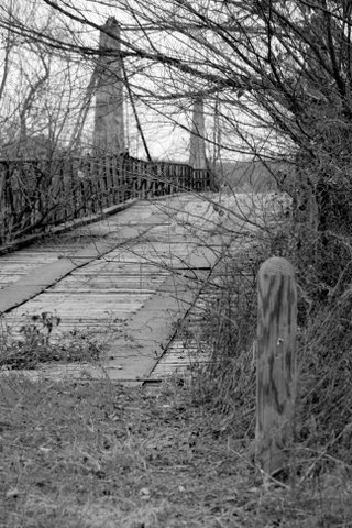 Approaching Woodson Texas suspension bridge 