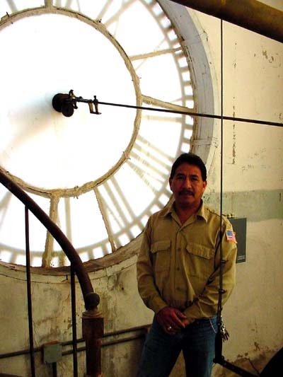 DeWitt County Courthouse clock and courthouse custodian