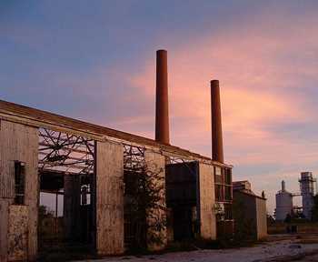 NewgulfTexas Power Plant and  smokestacks at sunset