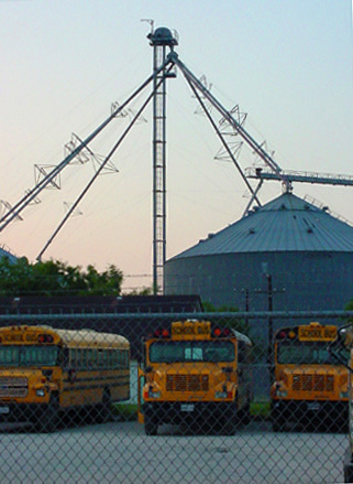 Ricardo, Texas - Grain elevator and school buses,
