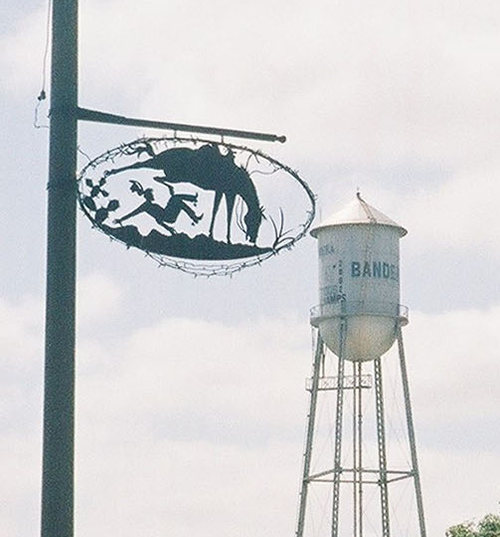 Bandera TX  water tower & cowboy metal  sign