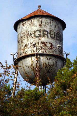 Gruene Texas old water tower, close up showing dent
