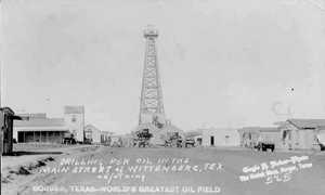 Drilling for oil, main street, Whittenburg, Texas old photo