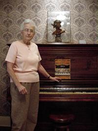 Robert E. Howard Museum docent Era Hanky and period piano 