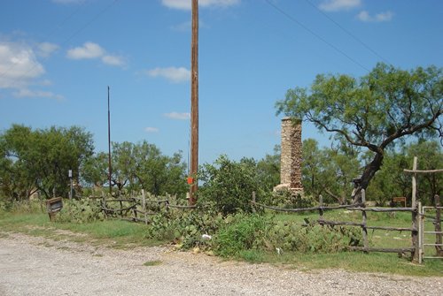 Fort Phantom Hill Texas chimney  among cactus