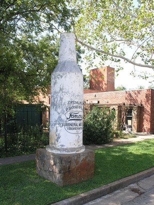 Giant bottle of mineral water in front of Famous Mineral Water Co. in Mineral Wells