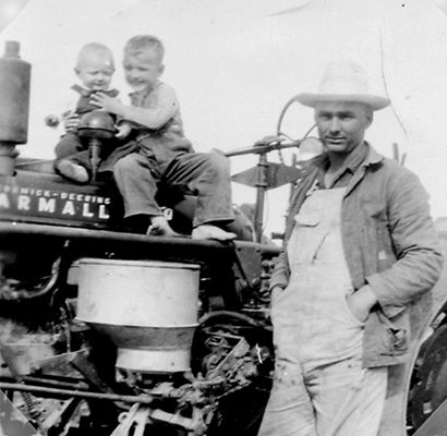 Rosebud TX - Emil Skupin and boys by Farmall H tractor 