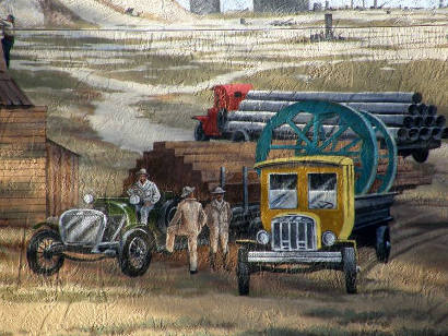 Odessa Tx - Oil Field Painted Mural showing pipes, and workers